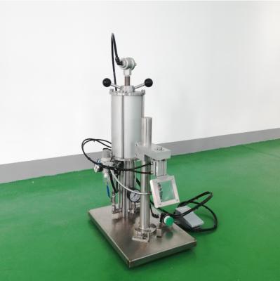 China Small pneumatic food aerosol gas filling machine for aerosol cans for sale