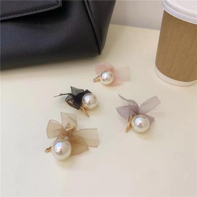 China Eco-friendly Girls Children's Hair Accessories Chat Alloy Hairpin Pearl Bow Edge Headdress Hairpin for sale