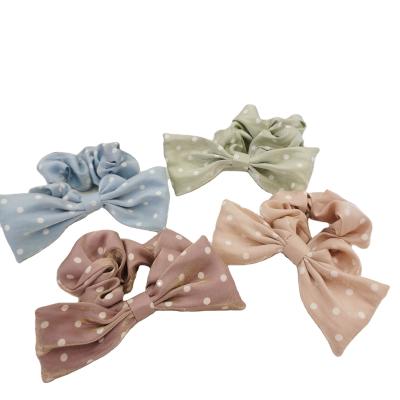 China Elastic Hair Band Polka Dot Fabric Soft And Comfortable Bow Tie Two Point Hair Ties Attractive Cool Girls Elastic Hair Band for sale