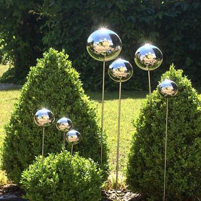 China Custom Made Stainless Steel Europe Metal Blossom Tree Art Outdoor Luxury Globe Garden Sculpture Polished Sculpture for sale