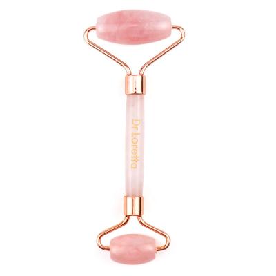 China Portable in the Body Routine Wholesale Anti Aging Natural Nephritis Face Lift Low Price Pink Jade Roller With Logo for sale