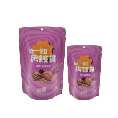 China Recyclable Purple Self-supporting Tote Bag Aluminum Foil Pouch With Round Holes Is Suitable For Nuts Nuts for sale