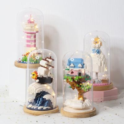 China DIY TOY Micro Building Blocks One Piece Wedding Dress Lighthouse Treehouse Kids Mini Brick Toys Box LED Light With Display for sale