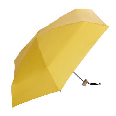 China Mini Pocket Umbrella Folding Sun Umbrella Women Travel Foldable Flat Lightweight Umbrella Protection UV Sunshade Lxd301 for sale