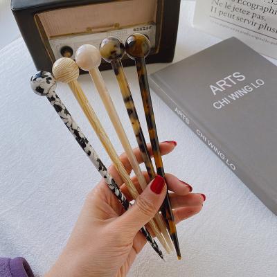 China Fashion Hot Selling Women Luxury Acetate Hair Chop Stick Disc Roll Head Chinese Hair Pin Sticks for sale