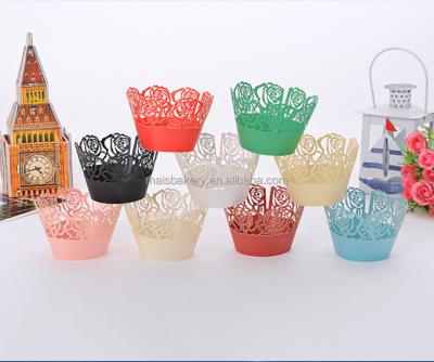 China Rose Paper Laser Cut Cupcake Wrappers Paper Baking Cup Holder For Wedding New Year Eve Birthday Cake Decoration for sale