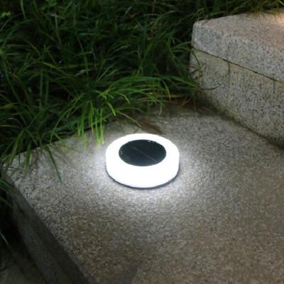 China Cute Cat Paw Lawn Light Solar Power Garden Lamp Controlled IP65 Garden Waterproof System Warm White/White Color for sale