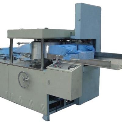 China Disposable Nonwoven Fabric Machine High Capacity Nonwoven Cloth Sheet Cutting Folding Machine for sale