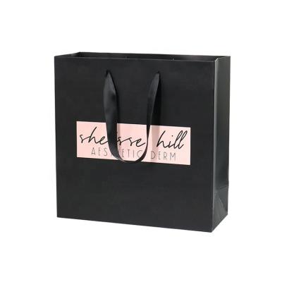 China Recyclable Custom Gift Bag Retail Boutique Paper Shopping Bag With Logo for sale