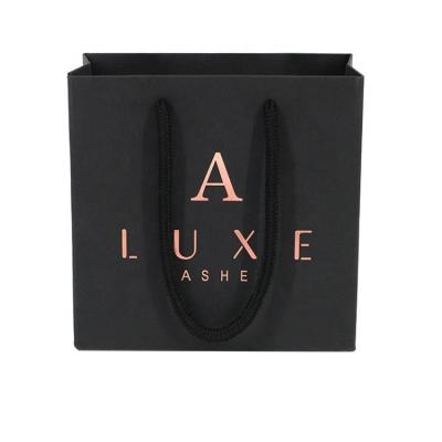 China Brand Logo Design Promotion Luxury Clothing Wholesale Custom Recyclable Custom Printed Retail Gift Jewelry Shopping Black Paper Bag With Handle for sale