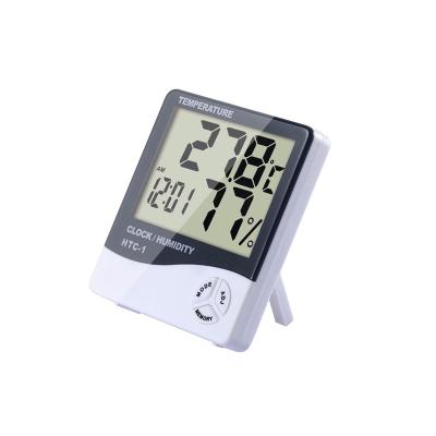 China Indoor Indoor Room LCD Temperature Humidity Meter Digital Thermometer Hygrometer Weather Station Electronic Alarm Clock HTC-1 for sale