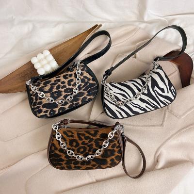 China Fashion Double Strap Armpit Armpit Handbag Fashion Double Strap Animal Print Zebra Leopard Clips Shoulder Bag For Women for sale