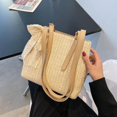 China Lady 2021 simple design fashion new fashion roap bag straw bag summer beach weaving scarves bow for sale