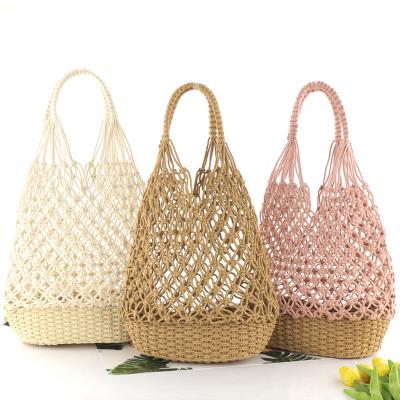 China Latest Vintage Factory Straw Bucket Bag Vintage Designer Hollow Shoulder Woven Beach Bags Bag for sale