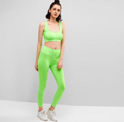 China Wholesale Neon Racerback Gym QUICK DRY Bra And Leggings Set For Women for sale