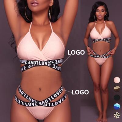 China Fashion QUICK DRY Custom Design Sexy Women Lingerie Sets Lace Trim Letter Ties Print Crisscross Bralette Bra And Panty Set for sale