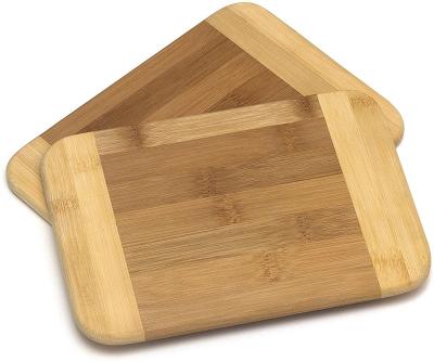 China Sustainable Wholesale Two Tone Acacia Wood Cutting Board With Hole Wood Chopper For Meat, Vegetables for sale