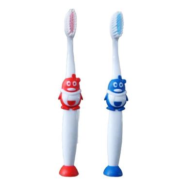 China 2020 Kids Toothbrush Classic Design Penguin Design Handle Soft Stiffen / Suction Bottom Kids Toothbrush for sale