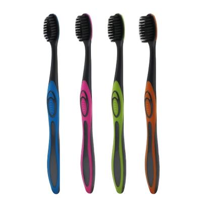 China Charcoal stiffens hot sale cheap price soft charcoal stiffens rubber grip / adult toothbrush custom logo for sale