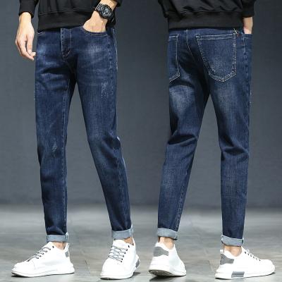 China Breathable Fall winter men's new style jeans straight-leg slim-fit elastic ripped light-colored plus size men's jeans for sale