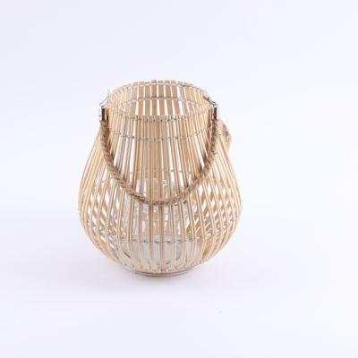 China Outdoor Classic Rattan Storm Lantern Candle Camping Bamboo Weaving Woven Lantern for sale