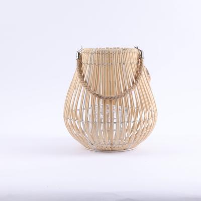 China Classic Hot Selling Home Deco Open Country Style Natural Handmade Rattan Vintage Storm Lantern Candle Bamboo Weaving Lantern for sale