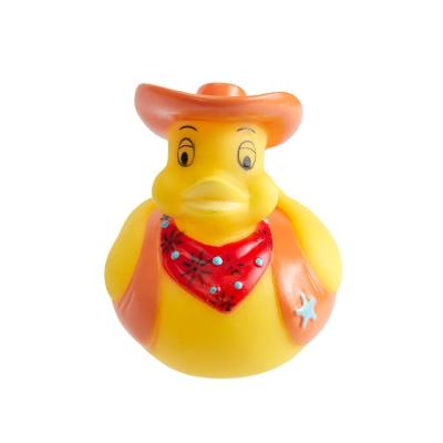 China Cute Cowboy Vinyl Duck Cusotomerzied Race Rubber Duck Bath Toy High Quality Novelty Style Weighed Floating Rubber Bath Toy Duck for sale