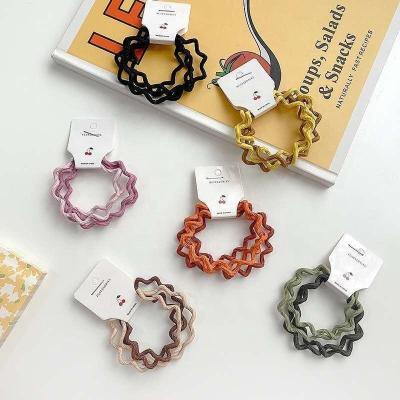 China Soft Hair Tie 4pcs/Set Spiral Elastic Hair Tie Ponytail Custom Logo Hair Ties Solid Color Hair Rope Accessories for sale