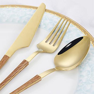 China Viable High Quality Amazon Handle Table Spoon Knife Dinner Tea Wooden Fork Set Stainless Steel Cutlery for sale