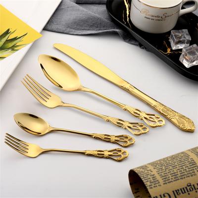 China Viable New Design Vintage Baroque Luxury Fork Spoon Knife Wedding Gold Silverware Vintage Gold Cutlery for sale