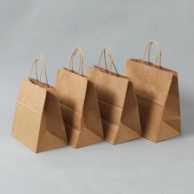 China Recyclable Kraft Bag For Packing Fast Food Package Tissue Paper Clothes Paper Bags for sale