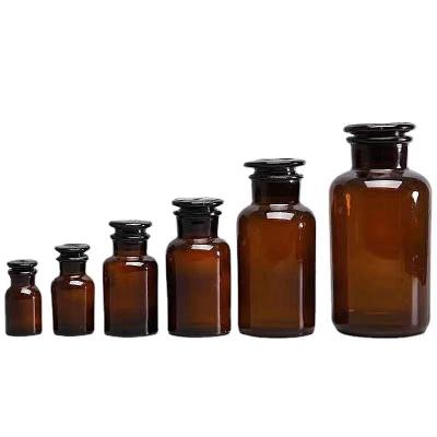 China 500ml Reagent Bottle Glass Narrow Bottle Laboratory Test Centrifuge Lipstick Bottles Concial for sale