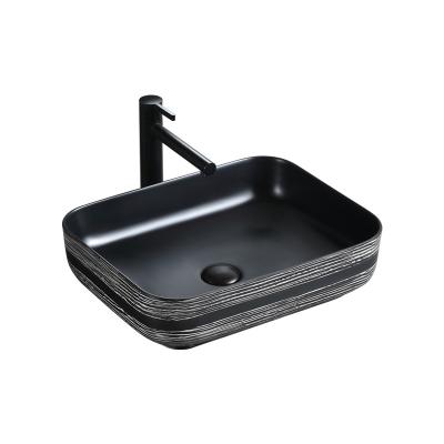 China Easy Clean Elegant Ceramic Decorative Washbasin Sinks Black Table Top Art Marble Sink for sale