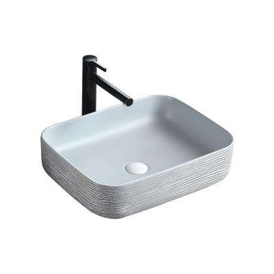 China Easy Clean Ceramic Sink Art Basin Cabinet Pakistan Vessel Sink Marble Look Wash Basin for sale