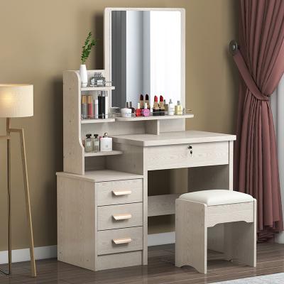 China Simple multifunctional storage cabinet and beauty personal care dressing table with sliding mirror and dressing table for sale