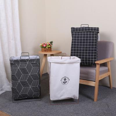 China Modern Metal X Shaped Bracket Foldable Clothes Cotton Canvas Fabric Laundry Hamper Dirty Bags With Lid for sale