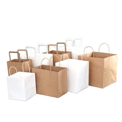 China Recyclable Wholesale Strong Kraft Paper Bag With Handle Takeaway Packaging Gift Shopping Bag for sale