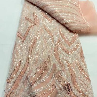 China Good Quality Heavy Beaded Lace Fabric Handmade Fashion French Lace Fabric Sequins Beaded For Women Party Dress for sale