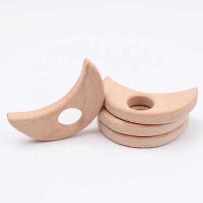 China Baby Wooden Teether Toy Wholesale Moon Shape Beech Baby Teether Soft Wooden Moon Toy Wooden Necklace Pendants New for sale