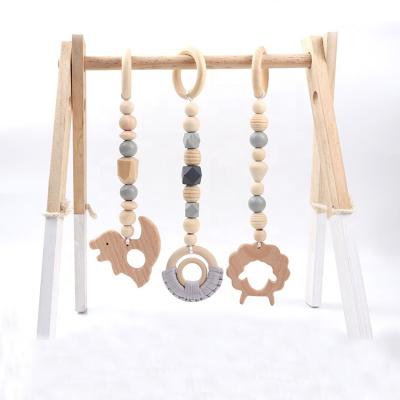 China Newborn Wooden Baby Gym Decor Room Activity Toys Teething Hanging Toys Musical Play Pendant for Baby Gym for sale