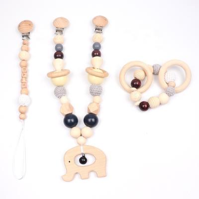 China Custom Wooden Infant Toy Chain Baby Pram Personalized Stroller Chain Set Pacifier Clips Baby's Toy Bed for sale