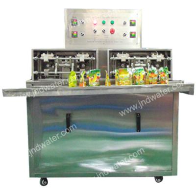 China Beverage Bag Juice Mineral Pure Water Semi-automatic Filling and Sealing Machine for sale