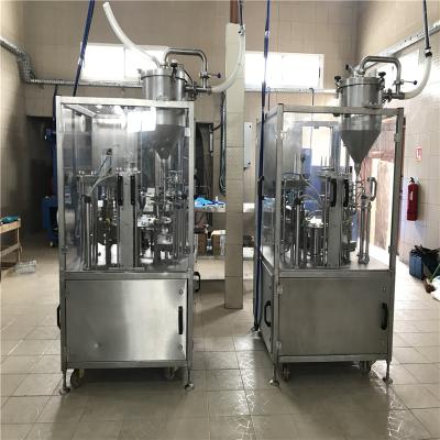 China Roll Film Cupping Cupping Machine Beverage Certification and Automatic Sealing Filling Machine for sale