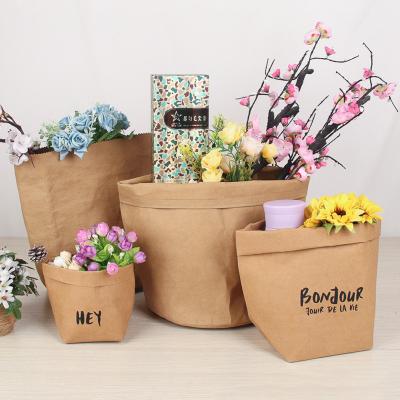 China Eco-friendly Handled Classified Washable Washable Materials Recycled Natural Materials Household Items Baskets Children's Toys Bucket Kraft Paper Laundry Bag for sale