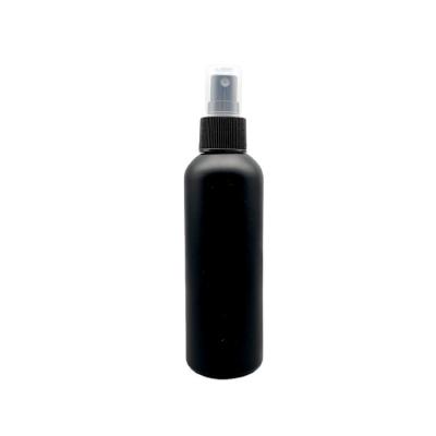 China Empty cosmetic plastic bottle and cosmetic round jar with black frosted color spray dropper and pump for essential oil for sale