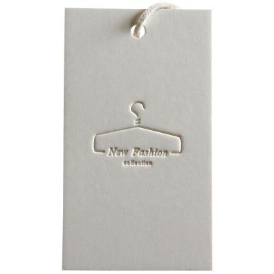 China Viable Custom UV Printing Embossed Luxury Brand Logo Recycled Paper Cardboard Hang Tag For Clothes for sale