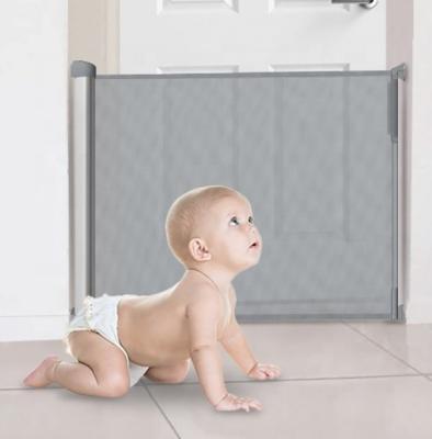 China Newest Baby Gate Pet Retractable Retractable Safety Gate Protective Barrier for sale