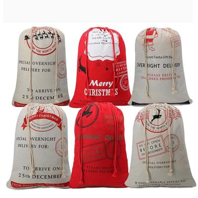 China Present Santa Stocking Gift Sack Express Delivery Christmas Bags Cotton Canvas Red Drawstring Gift Bag North Pole Gift Storage Bag for sale