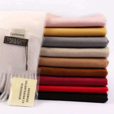 China Elegant good quality 250g cashmere scarf with tassel women solid color winter soft warm thicker shawls factory supplier for sale