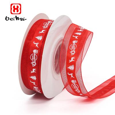 China High Tenacity Decorative Festival Stocked Style 25 Mm Screen Printed Pastel Logo 3 Colors Option Organza Christmas Style Gift Ribbon Roll for sale